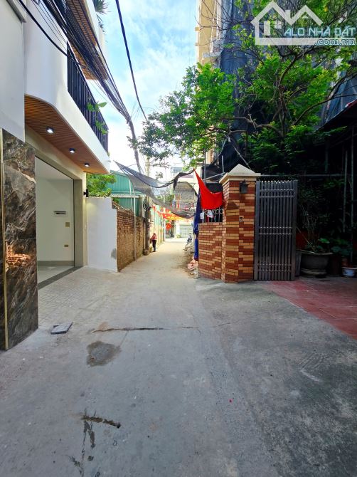 BÁN NHÀ THẠCH BÀN 6 TẦNG THANG MÁY - GARA 7 CHỖ - NỞ HẬU TÀI LỘC — ảnh 2